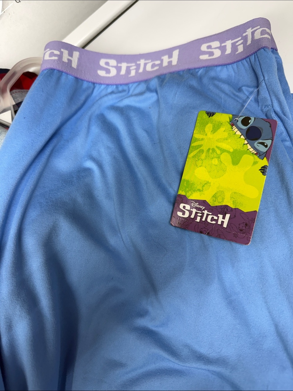 Disney Light Blue Lounge Shorts with Lavender Waistband and Stitch Tag